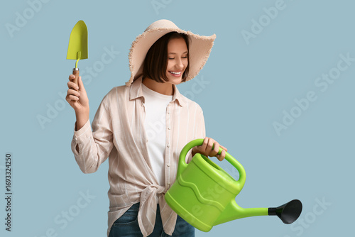 Smiling young woman with wa...