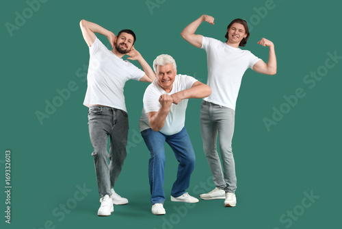 Happy men showing muscles o...