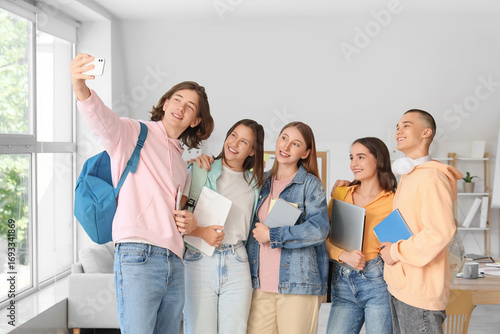 Group of students taking se...