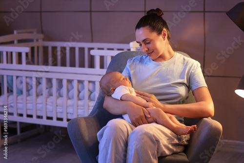 Happy young mother with her...