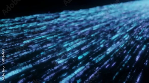 Angled closeup view illuminated blue and purple striated texture likely a surface dark background