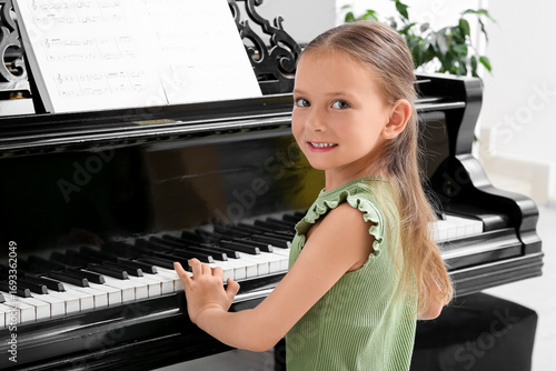 Cute little happy girl with...