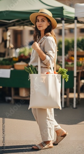 A Woman with a Tote Bag at a Farmer's Market Strolling on a Sunny Day