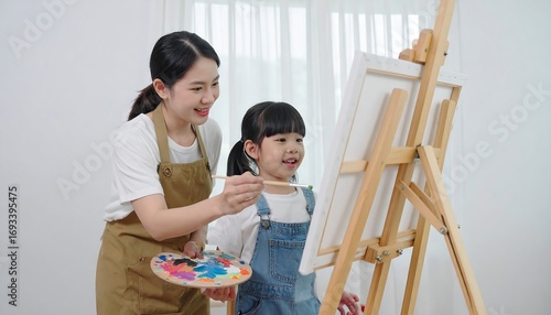 Mother and daughter painting