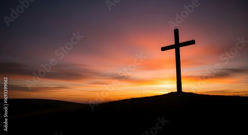 A powerful silhouette of the Christian cross on a hilltop against a vibrant sunset, symbolizing faith, hope, and sacrifice