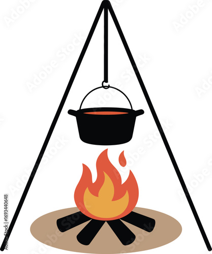Silhouette of a cooking pot over a campfire with flames