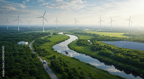 Aerial View of Wind Turbines and Solar Panels in a Green Landscape