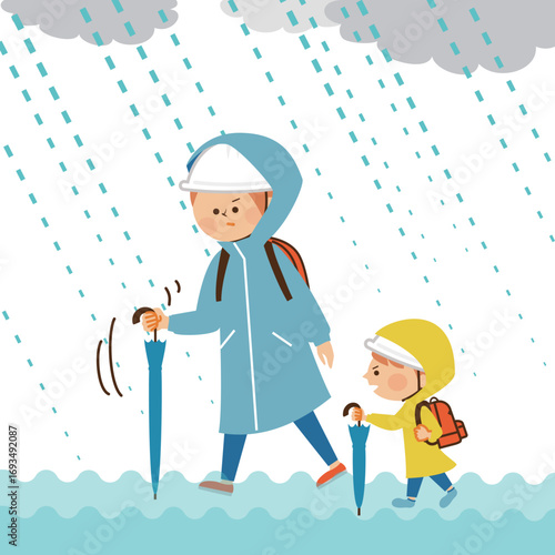 水害　避難する親子