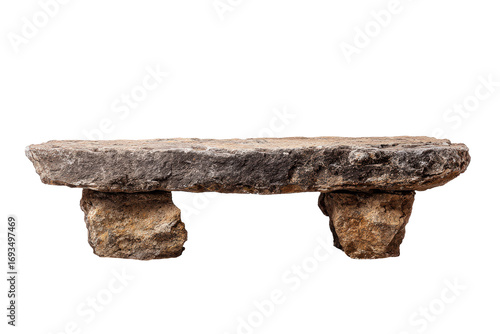 A simple primitive bench made from a flat stone slab and two rock supports.