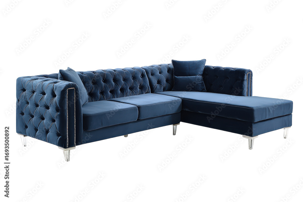 Fototapeta premium Luxurious deep blue tufted velvet sectional sofa with chaise lounge.