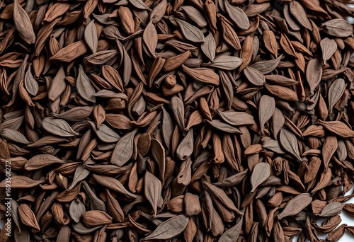 Deep brown, velvety texture of loose leaf organic camellia sinensis Assam tea, macro, velvety