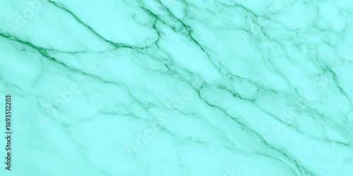 Elegant abstract green marble textures with swirling veins, rich color harmonies, fluid artistic patterns, seamless luxurious surfaces, modern decorative backgrounds, sophisticated design elements.
