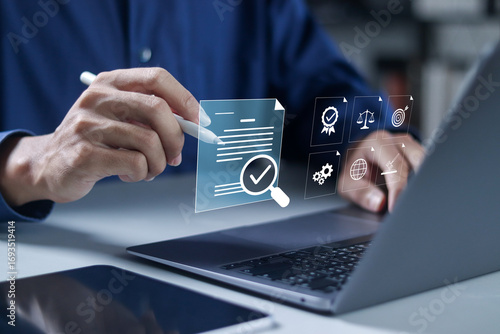 Compliance rules and law regulation policy concept. Enforcement of laws, regulations, and standards. Businessman use laptop with virtual icon.