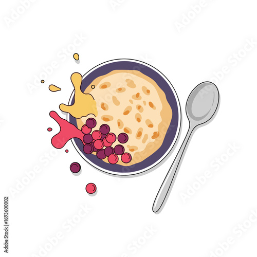 A delicious bowl of oatmeal topped with berries and syrup served with a spoon
