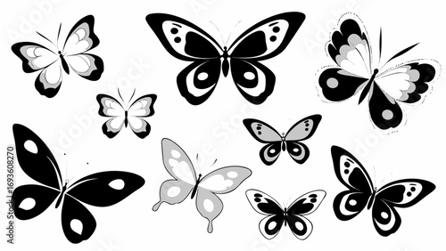 Elegant black and white butterflies scattered across a clean canvas, perfect for design.