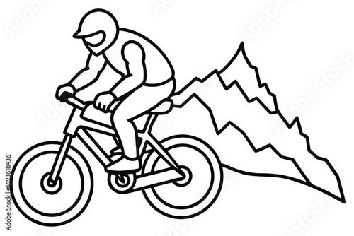 Mountain biker riding in front of jagged mountain peaks mountain biking bicycle
