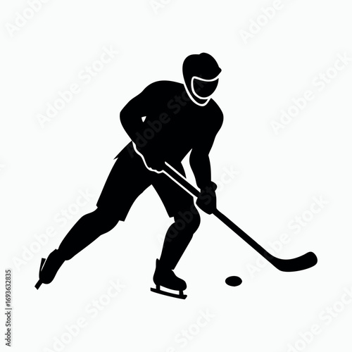 Dynamic silhouette of a hockey player in action with stick and puck displaying athleticism and sporty movement frozen in time silhouette