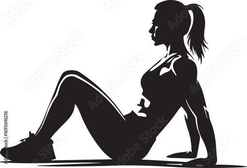 Silhouette of a fit woman performing crunches on a yoga mat exercising