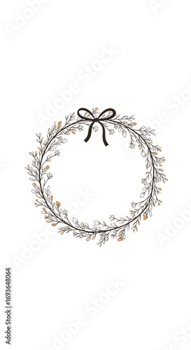 Elegant delicate floral wreath with a rustic bow adorning the top