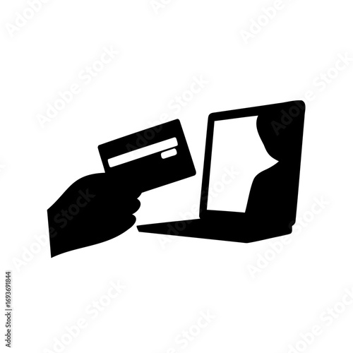 Online payment processing icon illustrating a hand holding a credit card near a laptop