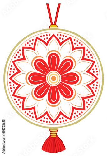 Traditional ornamental pendant with floral motif and tassel in red and gold colors