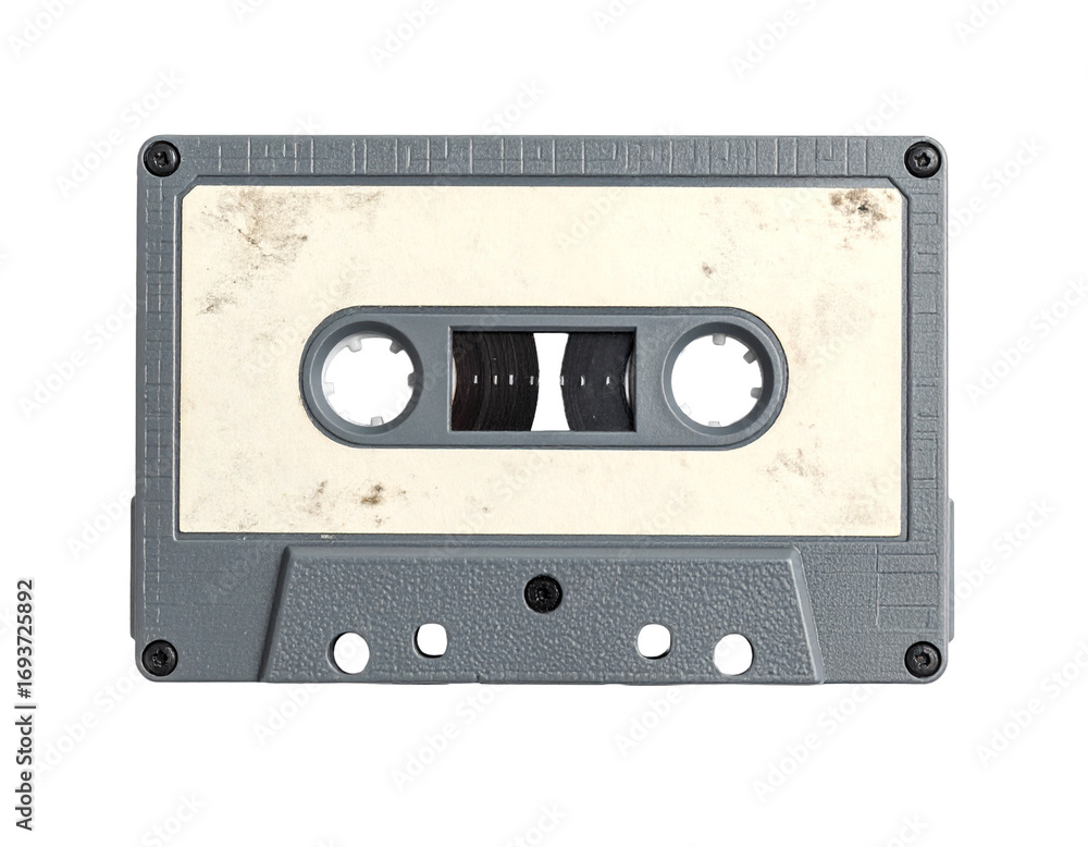 Fototapeta premium An old retro compact cassette tape with a clear case, isolated on a white background, vintage technology.