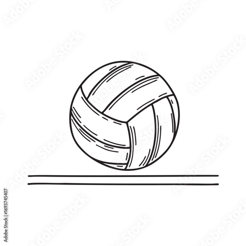 A volleyball resting near the center line of a court