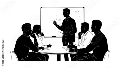 Business leader presenting to a team in a meeting