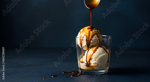 Delicious Affogato Dessert with Vanilla Ice Cream and Chocolate Coffee Drizzle on a Dark Blue Background.