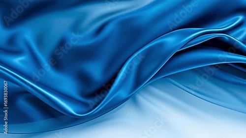 Close Up of Smooth Flowing Blue Silk Fabric with Shiny Texture Creating Luxurious and Elegant Appearance
