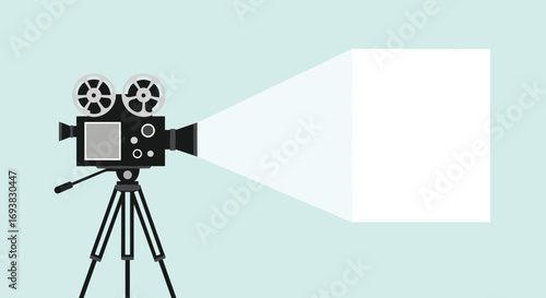 Vintage film projector showing a blank screen and casting light on a minimalist background