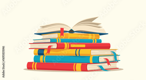 A stack of colorful books open with pages gently blowing in the wind