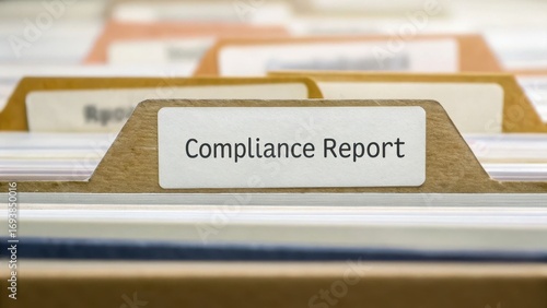 financial compliance legislation organization concept. Folders containing organized compliance reports in an office setting.