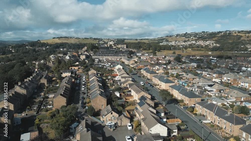 Drone shot of Rows of brick houses and narrow streets at Golcar residential neighborhood
