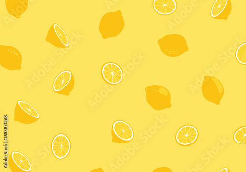 Vibrant yellow background with scattered fresh lemons and slices ideal for summer refreshment themes