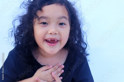 Expression of an Asian girl with a cute face.