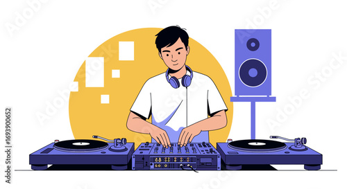 Young DJ Mixing Music on Turntables and Mixer.