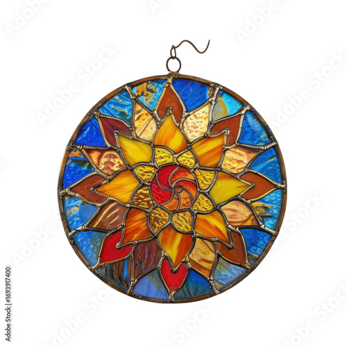 Colorful stained glass sun catcher with intricate flower design hanging against a bright background