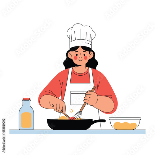 A young woman in a chef's hat and apron is happily cooking food in a pan