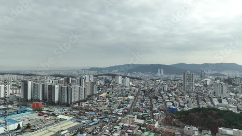 A panoramic view of apartment complexes and industrial complexes in Cheongju city, Korea