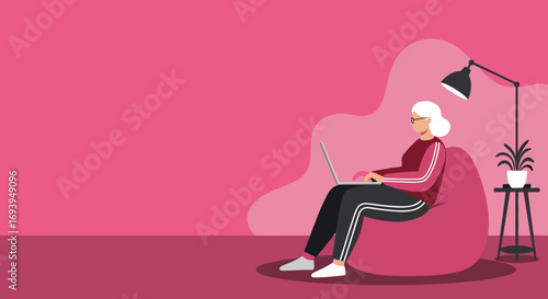 An older woman comfortably works or learns on her laptop from a beanbag chair at home, embracing modern remote productivity and a relaxed lifestyle.