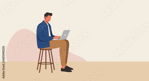 Modern man working casually on a laptop while sitting on a stool, illustrating remote work, online education, or freelance lifestyle. Ideal for business, technology, or lifestyle concepts.