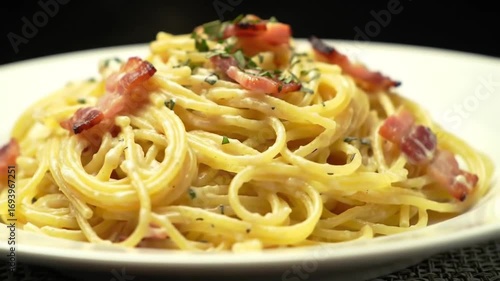 Creamy pasta carbonara glistening and delectable
