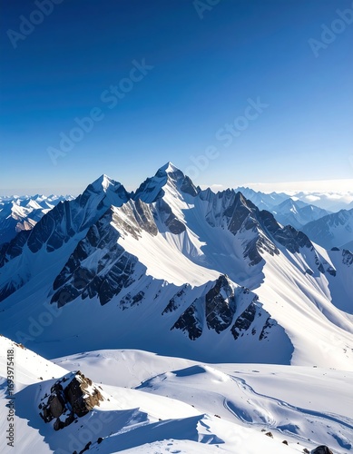 Snowy mountain peaks under a clear blue sky (1)