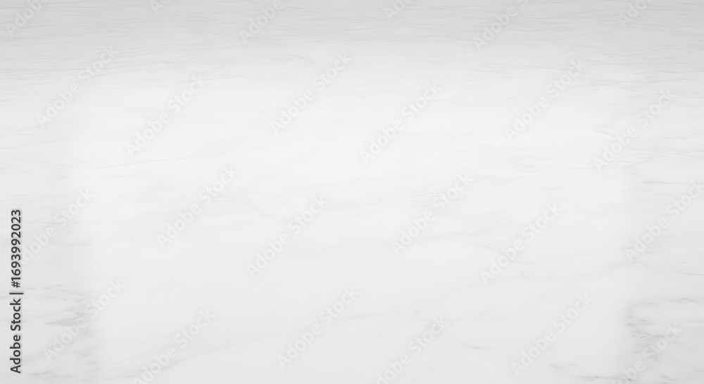 Obraz premium A minimalist, high-key image featuring a soft, white surface with subtle textures.