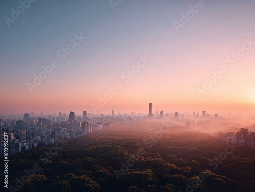 A breathtaking aerial view of a city skyline at sunrise, juxtaposing nature with urban landscape. The pink and orange hues create a serene, dreamy atmosphere.
