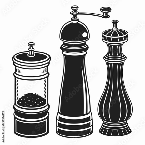 Three black and white spice grinders and shakers pepper mill salt shaker