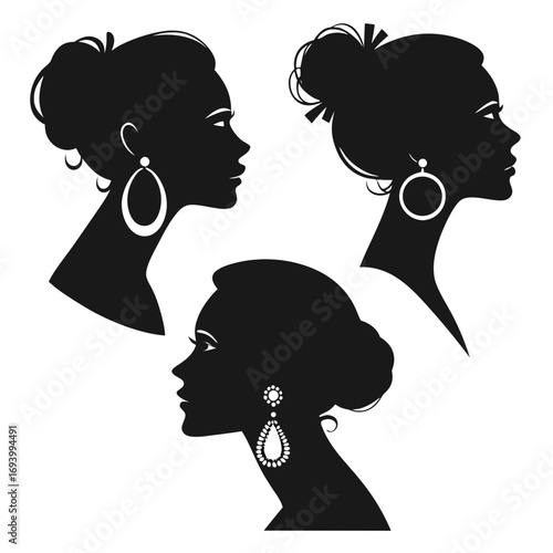 Three elegant female profile silhouettes adorned with earrings vector