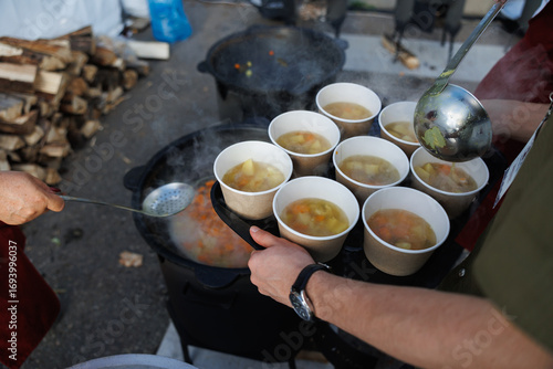 Offering Warm and Delicious Soup Served in EcoFriendly Cups for Everyone to Enjoy Together