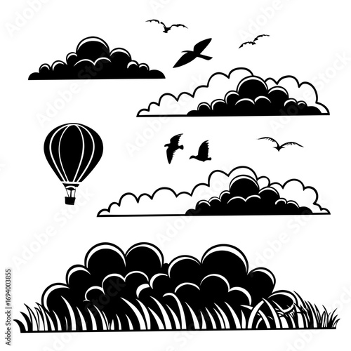 Black cloud shapes hot air balloon and birds silhouette flying